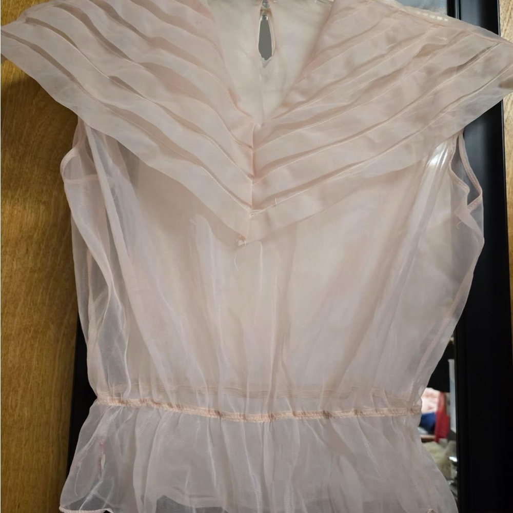 Pink Sheer Ruffled Sleeveless Blouse